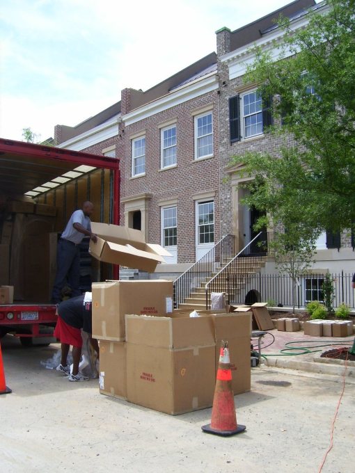 unloading boxes at the Senoia Idea House